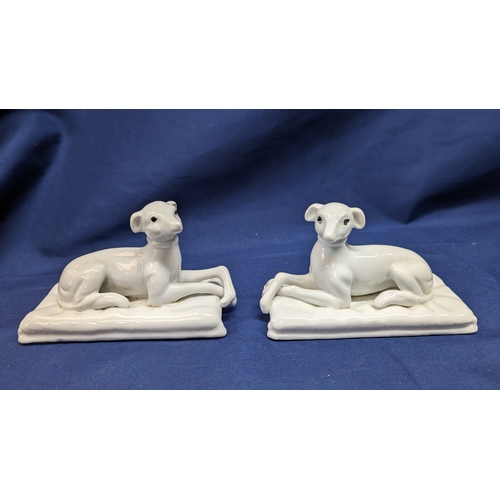 1206 - 1930's Opposing White Porcelain Whippet Collectable Whippet  Ornaments 13cm x 6cm x 8cm.   From the ... 