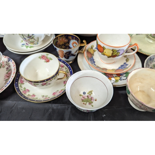 1217 - An Assortment of China Plates including a quantity of early 19th Century Teacups, Antique Rose and T... 