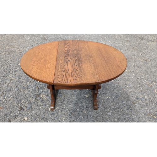 1237 - An Oak Twist Top Folding  Occasional Table  56cm x 75cm x 47cm Extended