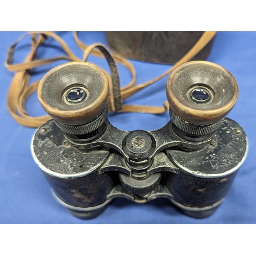 407 - A Pair of Schute Cassel binoculars with leather case