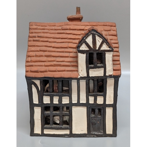 1198 - An O'Donohue Pottery Night Light Cottage (missing a chimney)