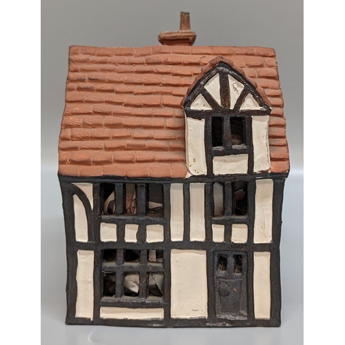 1198 - An O'Donohue Pottery Night Light Cottage (missing a chimney)