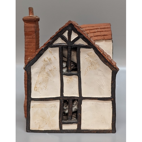 1198 - An O'Donohue Pottery Night Light Cottage (missing a chimney)