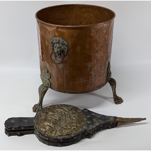 670 - Copper Log Bin with Brass Lions Head Handles and Claw Feet and a Set of Bellows