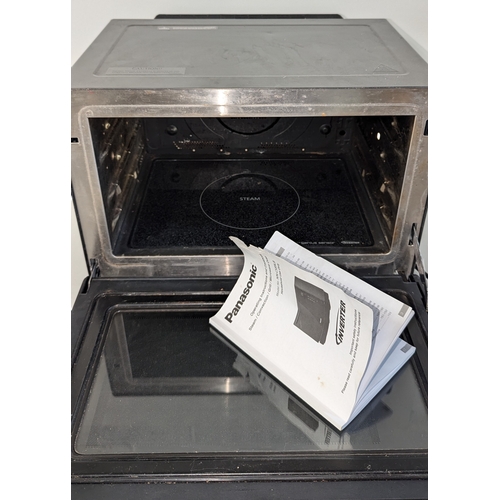 1112 - A Panasonic Steam Inverter Microwave Oven NN-CS89LB (RRP £600) - Requires Water Tank and Drip Tray