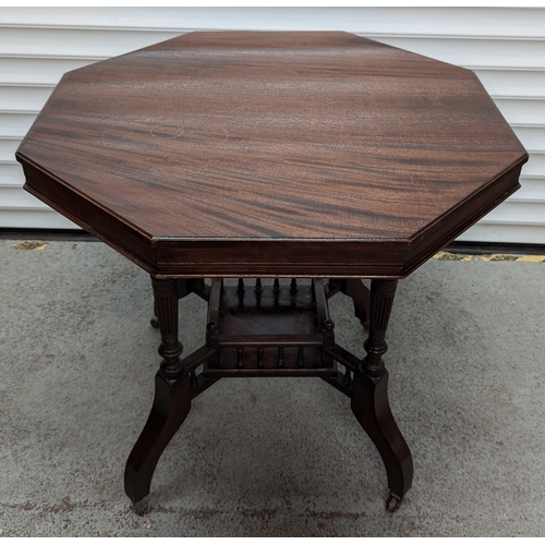 57 - An Edwardian Octagonal Occasional Table on Castors - 72 x 74 x 74