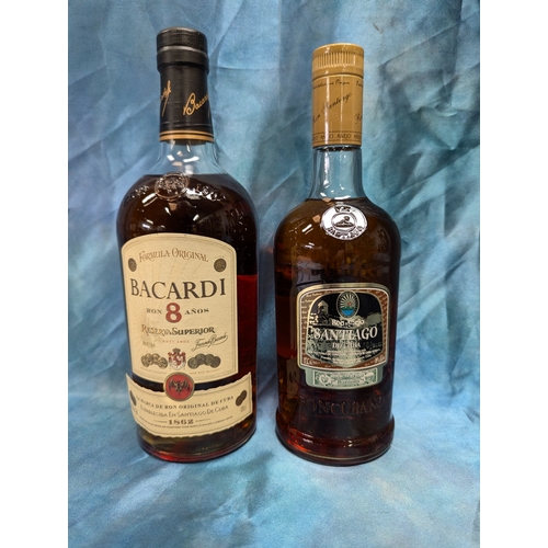 101 - A 1ltr Bottle Of Bacardi 8 Year Rum And Cuban Santiago Rum 75cl.