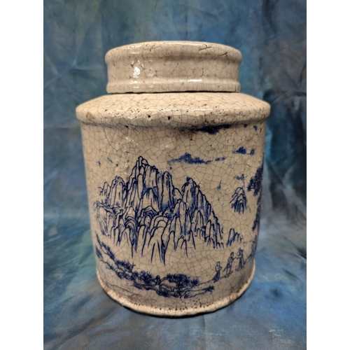 11 - A Large Chinese Crazed Glaze Tea Jar Depicting Mountain Scenes