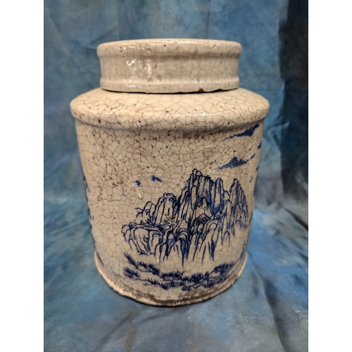 11 - A Large Chinese Crazed Glaze Tea Jar Depicting Mountain Scenes