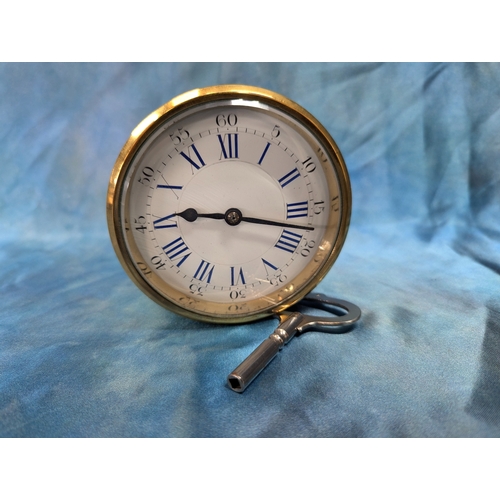 9 - A Brass Drum Clock With Roman Numerals - Running With Key 10cm Diameter