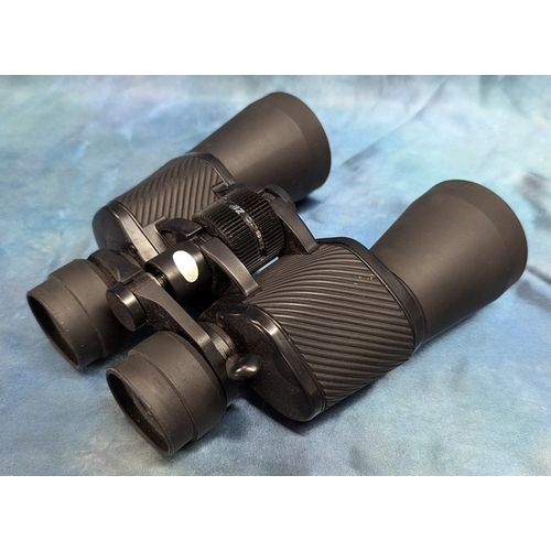 443 - A Pair Of Tasco Zip Binoculars