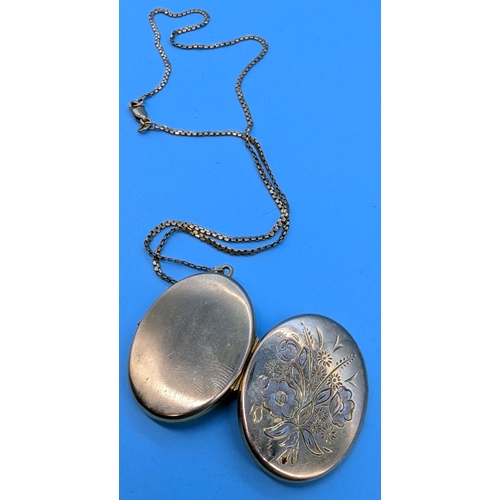 222 - A 9ct Gold Locket And Necklace - 9.3gms