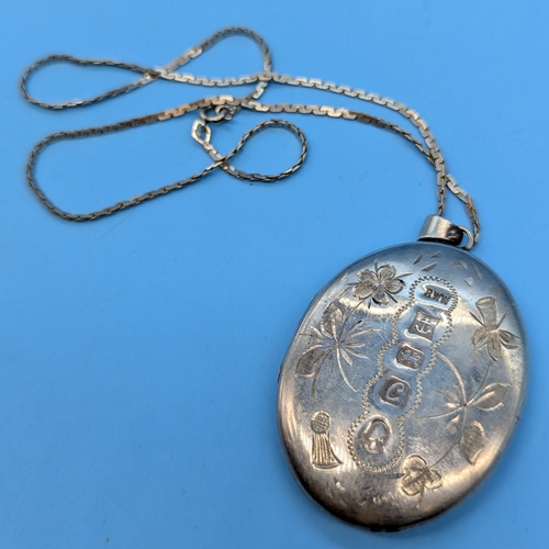 238E - A Hallmarked Silver Locket