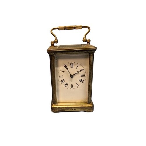 372 - A Brass Carriage Clock - No Key.  10cm Tall