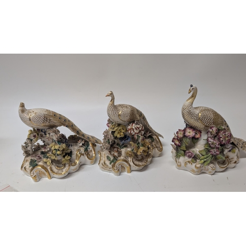 113 - Antique Hancock Derby Peacock Figurines x 3.  Some losses to figurines a pictured.  18cm Long, 17cm ... 