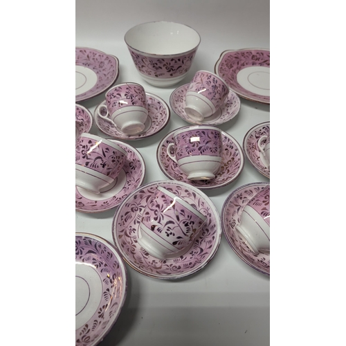 150 - A Collection of Antique Staffordshire Pink Lustre Rose Pattern Cups and Saucers, Plates, Bowl, Cake ... 