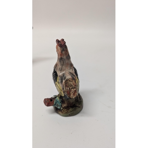 165 - Antique Figurines inc. 
-  Meissen Parrot 7cm Tall
- Staffordshire Cow 4cm Tall
- Majolica Rooster m... 