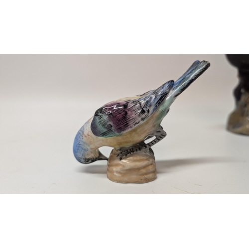 165 - Antique Figurines inc. 
-  Meissen Parrot 7cm Tall
- Staffordshire Cow 4cm Tall
- Majolica Rooster m... 