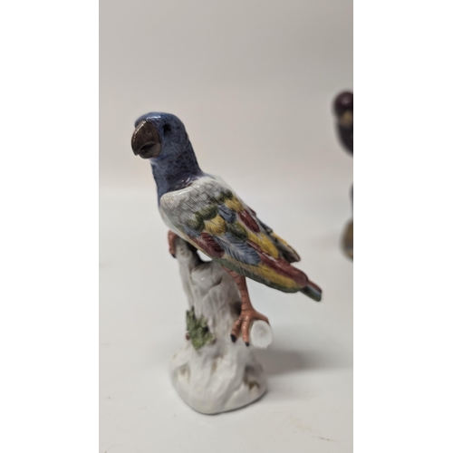 165 - Antique Figurines inc. 
-  Meissen Parrot 7cm Tall
- Staffordshire Cow 4cm Tall
- Majolica Rooster m... 