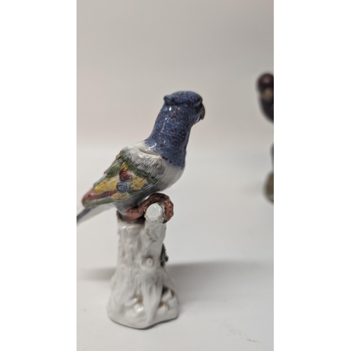 165 - Antique Figurines inc. 
-  Meissen Parrot 7cm Tall
- Staffordshire Cow 4cm Tall
- Majolica Rooster m... 