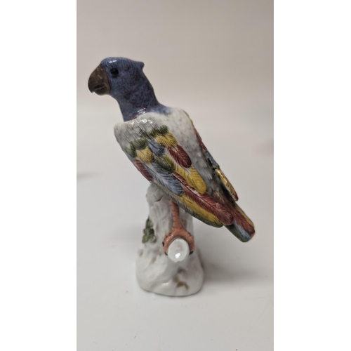 165 - Antique Figurines inc. 
-  Meissen Parrot 7cm Tall
- Staffordshire Cow 4cm Tall
- Majolica Rooster m... 