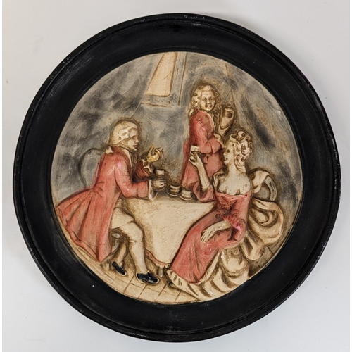 659 - 2 x Ceramic Wall Hanging Plates Featuring Dinner Scenes ( damage to 1 plate)