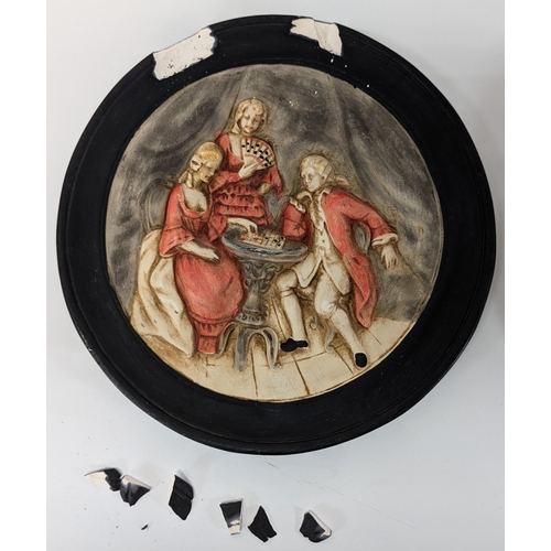 659 - 2 x Ceramic Wall Hanging Plates Featuring Dinner Scenes ( damage to 1 plate)