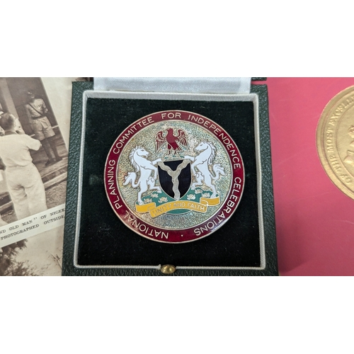 25 - The O.B.E, 9ct Gold Nigerian Port Authority Medallion, National Planning Committee For Independence ... 