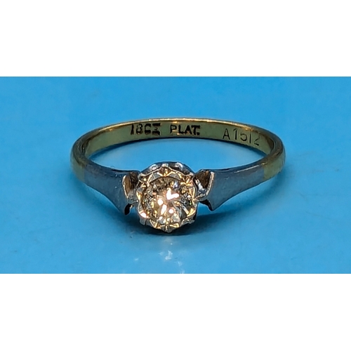 200 - An 18ct Gold and .2ct Diamond Ring In Platinum Setting - 2.1gms - Size L/M