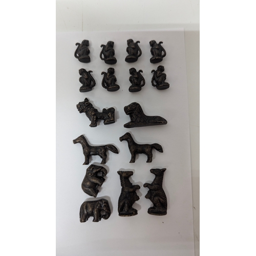 747 - An Amazing  set of Animal Chess Pieces in believed to Bronze in a metal folding board with pieces in... 