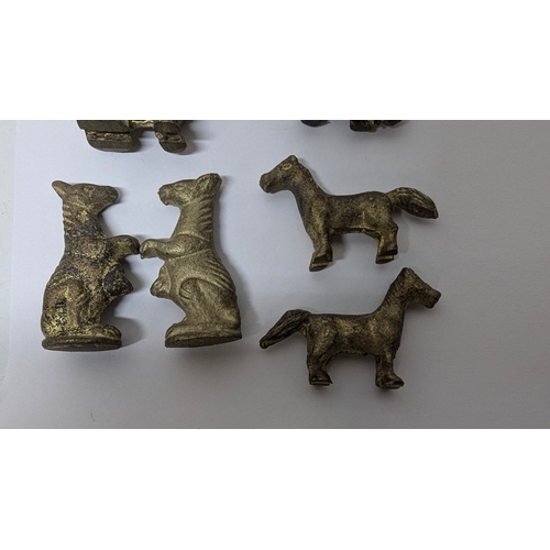 747 - An Amazing  set of Animal Chess Pieces in believed to Bronze in a metal folding board with pieces in... 