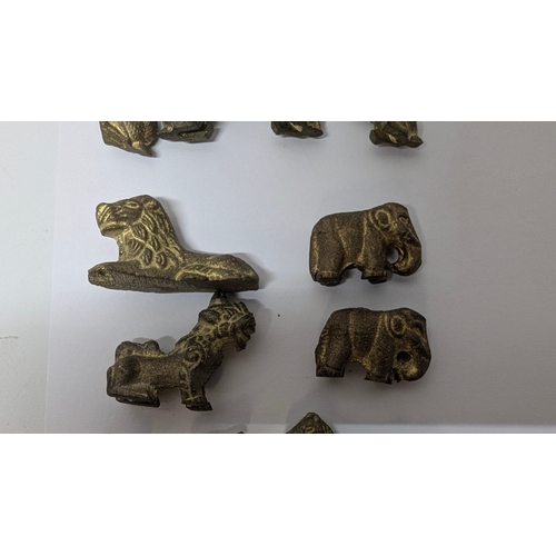 747 - An Amazing  set of Animal Chess Pieces in believed to Bronze in a metal folding board with pieces in... 