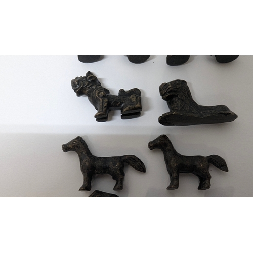 747 - An Amazing  set of Animal Chess Pieces in believed to Bronze in a metal folding board with pieces in... 