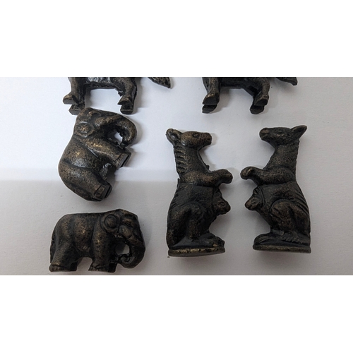 747 - An Amazing  set of Animal Chess Pieces in believed to Bronze in a metal folding board with pieces in... 