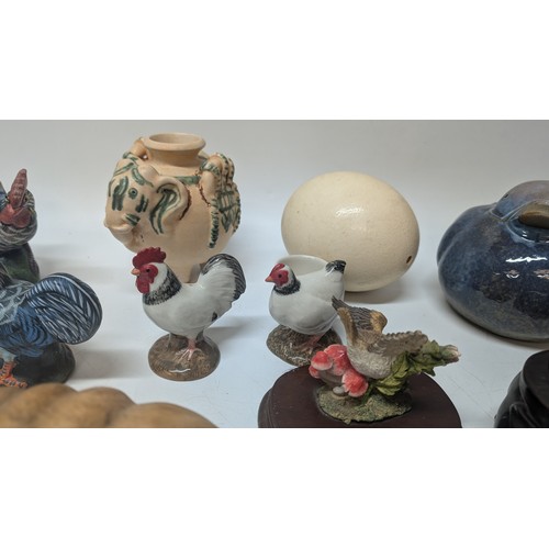 733 - A Collection of Ornaments inc. Wooden Snail, Pottery Hens, Ceramic Cow Pot, Elephant Vase, Egg, Chic... 