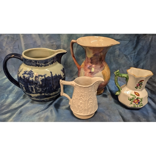 80 - A Decorative Victoria Ware Ironstone Pitcher together with a Price , Portmeirion and Masons Jugs