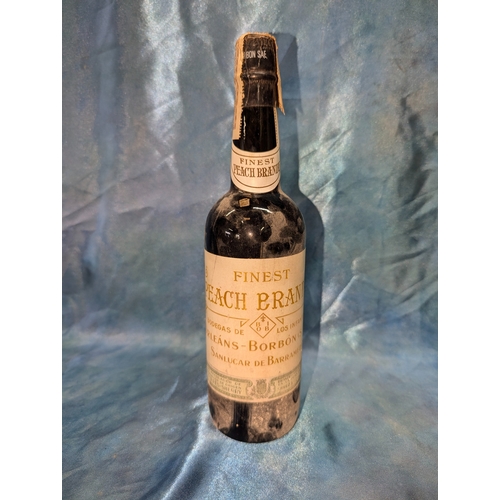 198 - A Bottle of Orleans - Bourbon Finest Peach Brandy