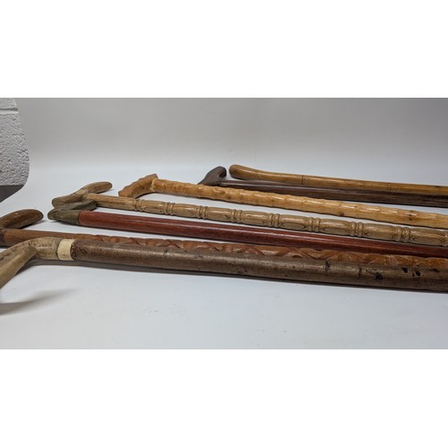 988 - 7 x Wooden Walking Sticks , various handles inc. Metal and Bone