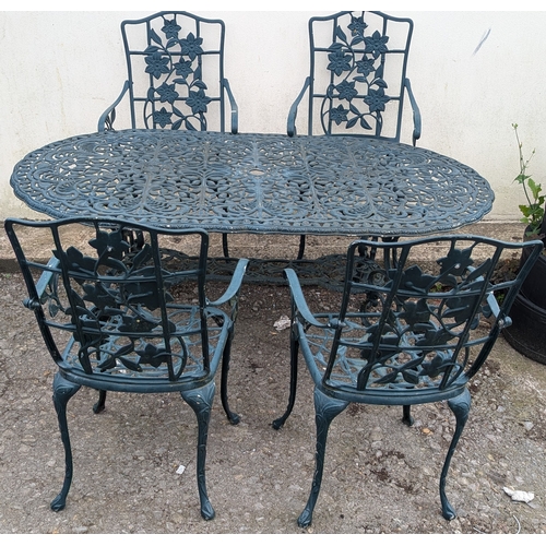 824 - A Green Metal Garden Table With 4 Chairs