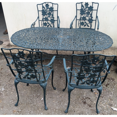 824 - A Green Metal Garden Table With 4 Chairs