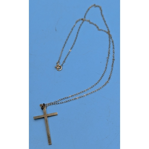 223 - A 9ct Gold Cross And Chain 1.5gms