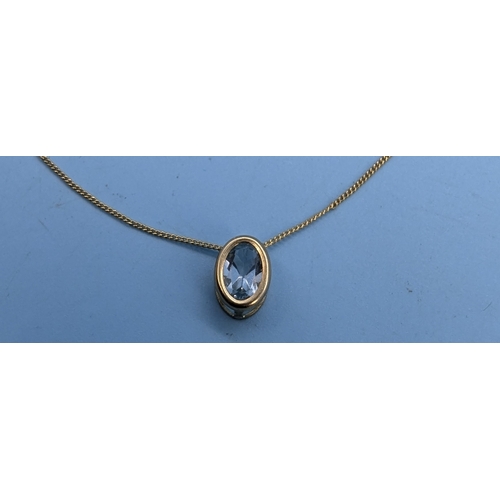 231 - A 9ct Gold Blue Topaz Pendant Necklace