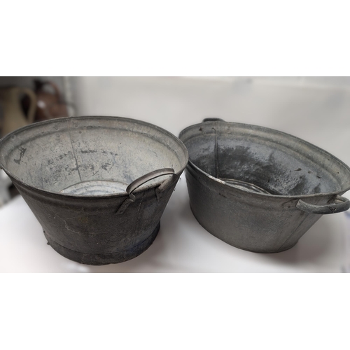 828 - 2 x Galvanised Pails 57cm and 60cm long