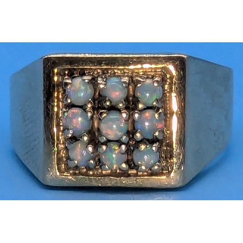 204 - A 9ct Gold, 9 Stone Opal Ring - Size V - 8.09gms