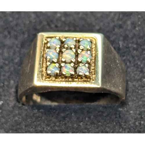 204 - A 9ct Gold, 9 Stone Opal Ring - Size V - 8.09gms