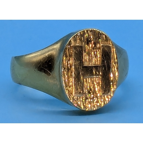 205 - .A Heavy 18ct Gold Ring With Raised 'H' Size S (Unhallmarked - Tests As 18ct)