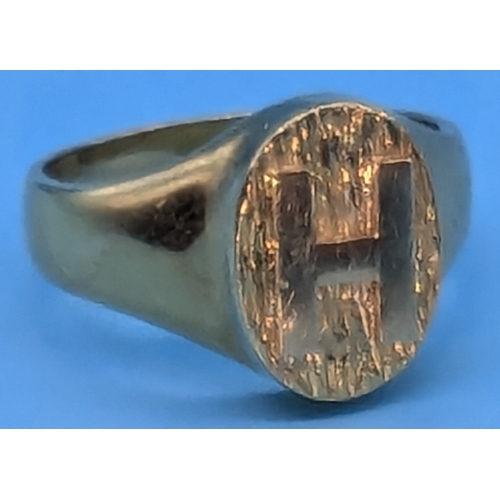 205 - .A Heavy 18ct Gold Ring With Raised 'H' Size S (Unhallmarked - Tests As 18ct)