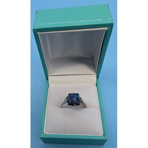 207 - 9ct Yellow Gold Ring With 1.5ct Blue Stone