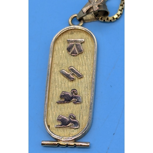 211 - A 9ct Gold Egyptian Cartouche Necklace And Chain With Hieroglyphics - 9.1gms