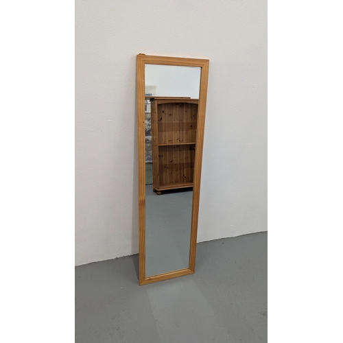 1010 - A Pine Framed Wall Hanging Mirror - 126 x 36cm